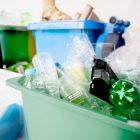 Used-plastic-bottles-recycling-bins-earth-day-campaign_53876-104848